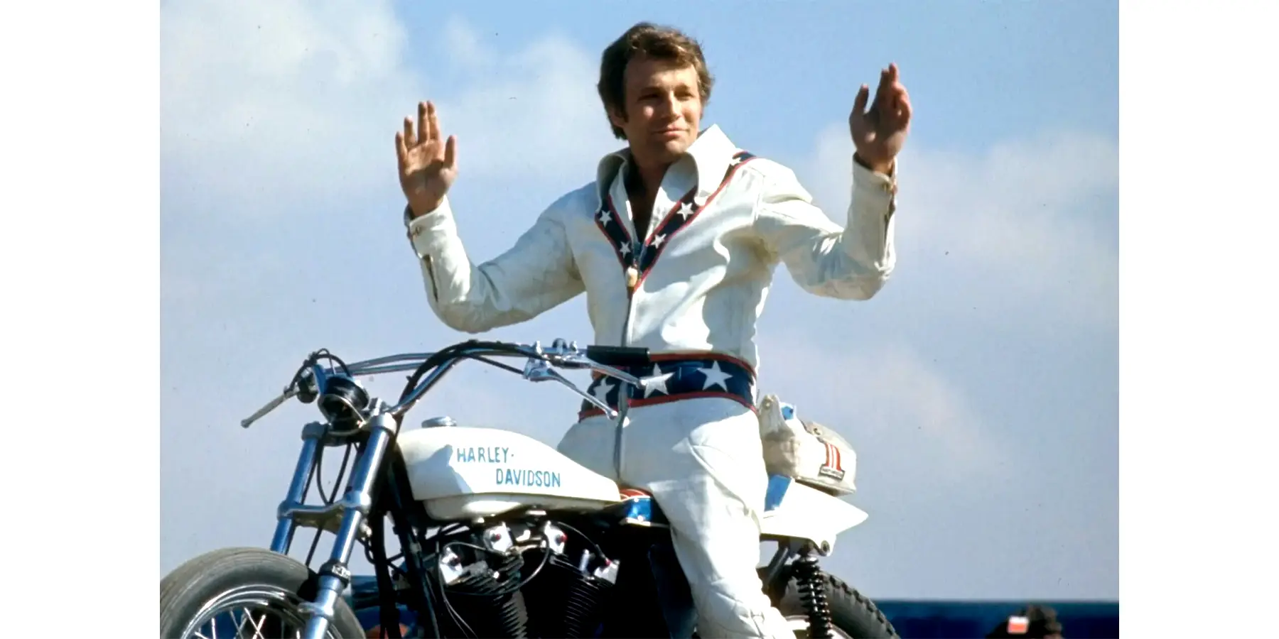 Photo of Evel Knievel posing on his motorcycle